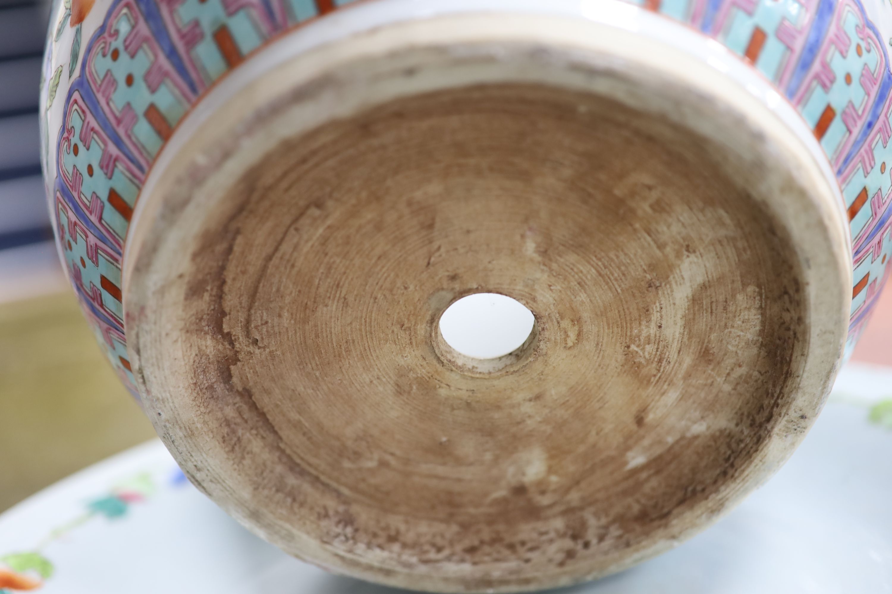 A 20th century Chinese porcelain jardiniere and dish, diameter 36 cms.